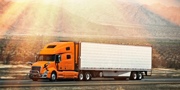 Semi Truck Moving Down a Road