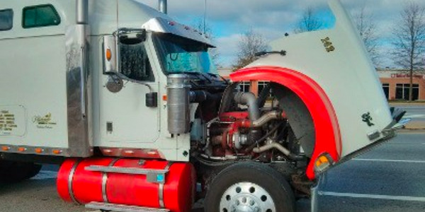 use comchek to pay for maintenance at a truck stop